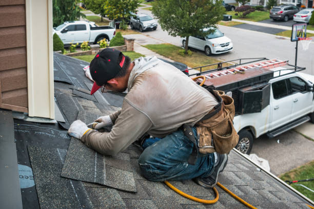 Professional Roofing technician working in Roberts, MT